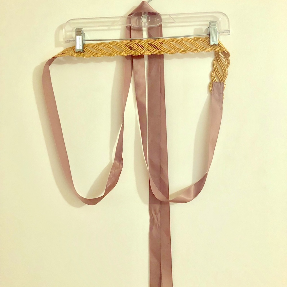 Gold belt with silk ties.